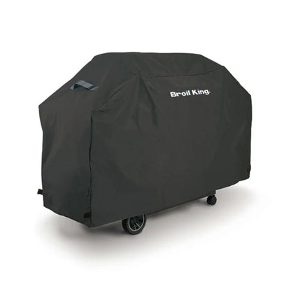 Broil King Royal 340 SELECT weather-resistant BBQ cover fitted over a gas barbecue.