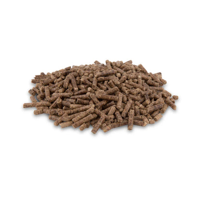 Pile of brown pellets on a white background