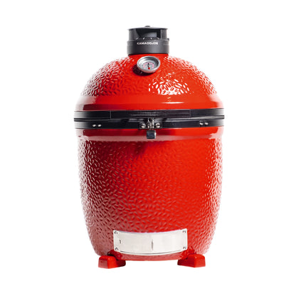 Red Kamado grill on a white background