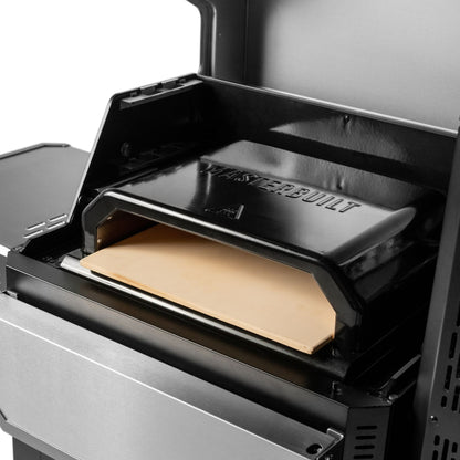 Masterbuilt pizza stone inside an open grill lid