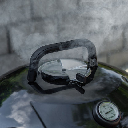 Close up of Char-Griller Kettle and smoke coming out the top.