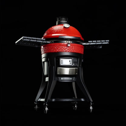 Red Kamado-style grill on a black background