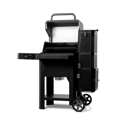 Black barbecue grill with wheels on a white background